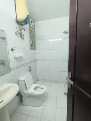 Bathroom in 2 BHK Apartment at South City Arcade, Sector 41 – for Rent