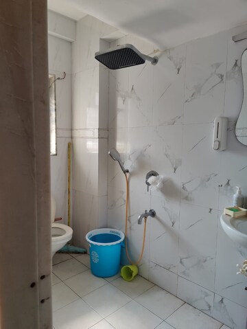 Bathroom in 4 BHK Apartment at Dhairya Apartments, Khar West – for Rent