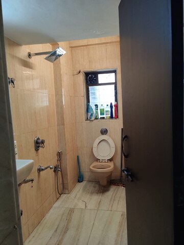 Bathroom in 4 BHK Apartment at Dhairya Apartments, Khar West – for Rent
