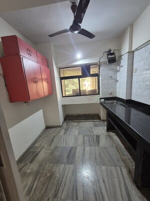 Kitchen in 2 BHK Apartment at Happy Valley, Manpada – for Sale
