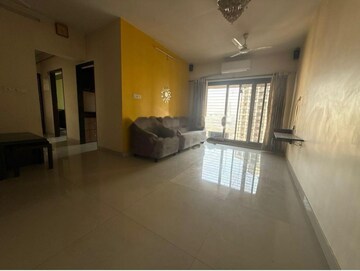 Living Room in 2 BHK Apartment at Acme Ozone Oakwood and Ashwood, Manpada – for Rent