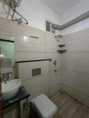 Bathroom in 1 BHK Apartment at Satguru Heights, Gulmohar Colony – for Rent