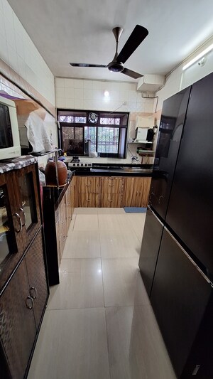 Kitchen in 2 BHK Apartment at Cosmos Heritage, Manpada – for Sale