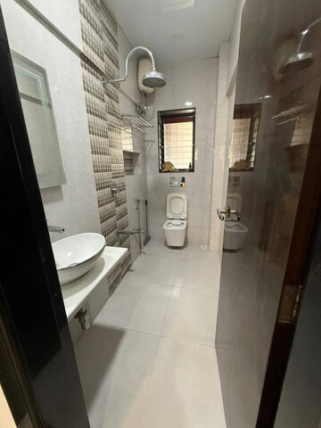 Bathroom in 3 BHK Apartment at Riddhi Garden, Malad East – for Rent
