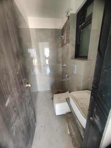 Bathroom in 2 BHK Apartment at Dev Leo Tower, Oshiwara – for Rent