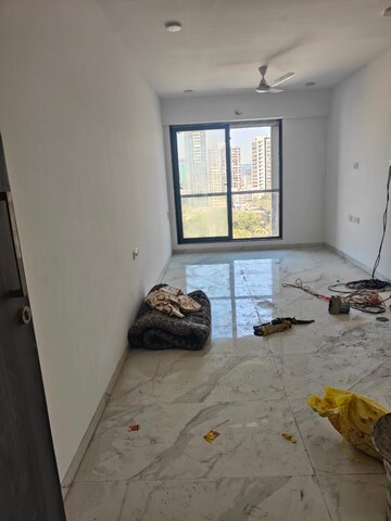 Living Room in 2 BHK Apartment at Dev Leo Tower, Oshiwara – for Rent