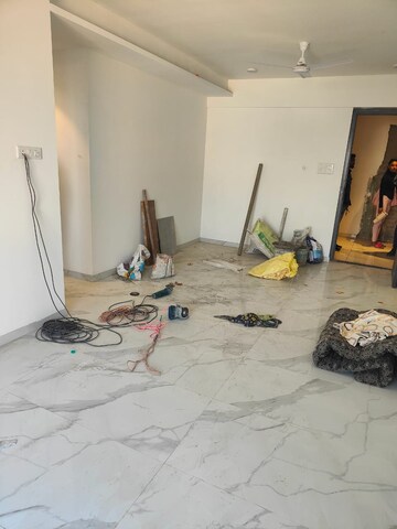 Living Room in 2 BHK Apartment at Dev Leo Tower, Oshiwara – for Rent