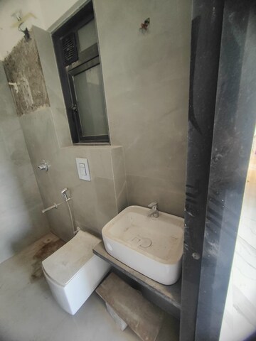 Bathroom in 2 BHK Apartment at Dev Leo Tower, Oshiwara – for Rent