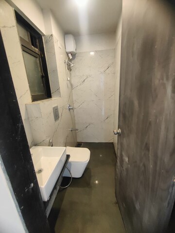 Bathroom in 2 BHK Apartment at Dev Leo Tower, Oshiwara – for Rent