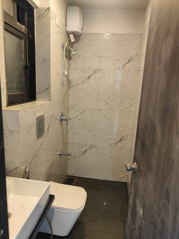 Bathroom in 2 BHK Apartment at Dev Leo Tower, Oshiwara – for Rent