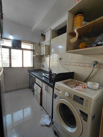 Kitchen in 2 BHK Apartment at Ashok Enclave Malad West, Malad West – for Rent