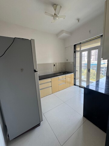 Kitchen in 3 BHK Apartment at Runwal Elegante, Andheri West – for Sale