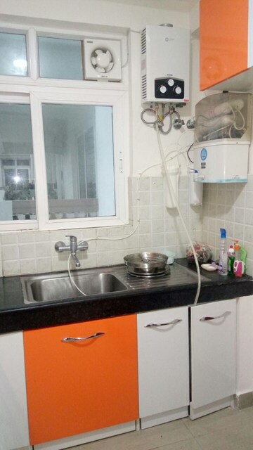 Kitchen in 3 BHK Apartment at Ramprastha City The View, Sector 37d – for Rent