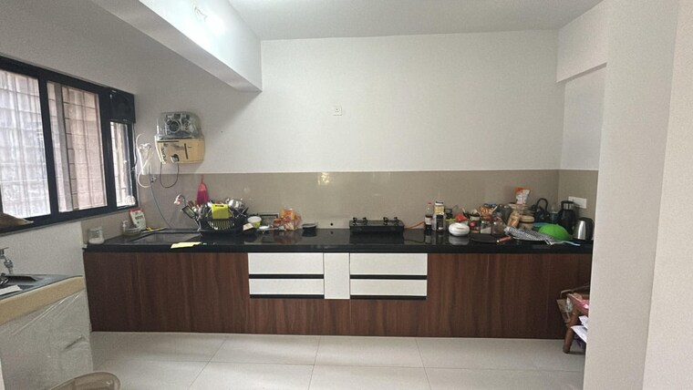 Kitchen, rainbow-revell-orchid 3 Bedroom 1200 Sq.Ft. Apartment In Lohgaon Pune 9658445