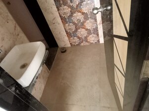 Bathroom in 2 BHK Apartment at Shubham Jijai Angan, Taloja – for Rent