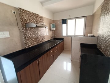 Kitchen in 2 BHK Apartment at G K Roseland Residency, Pimple Saudagar – for Rent