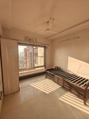 Bedroom in 3 BHK Apartment at Rattan Icon, Seawoods Sector 50 – for Rent