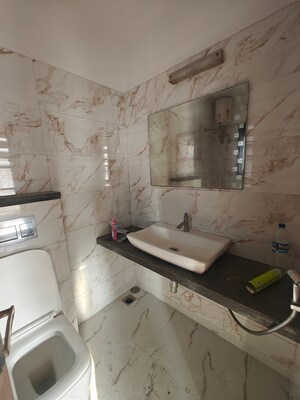 Bathroom in 3 BHK Apartment at Rattan Icon, Seawoods Sector 50 – for Rent