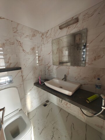 Bathroom in 3 BHK Apartment at Rattan Icon, Seawoods Sector 50 – for Rent