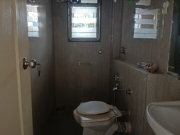 Bathroom in 2 BHK Apartment at Kalpataru Shravasti, Malad West – for Rent