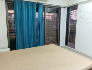 Bedroom in 2 BHK Apartment at Mayfair Housing Mayfair Marvel, Malad West – for Rent