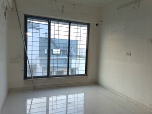 Room in 1 BHK Apartment at Shree Vallabh Tower, Malad West – for Rent