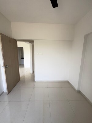 Living Room in 1 BHK Apartment at Paranjape Schemes Madhukosh, Dhayari – for Sale