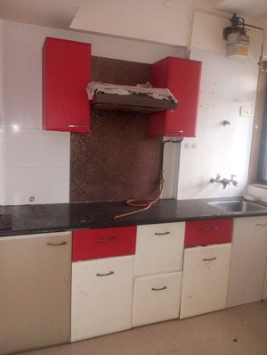 Kitchen in 1.5 BHK Apartment at Puranik Hometown, Ghodbunder Road – for Rent