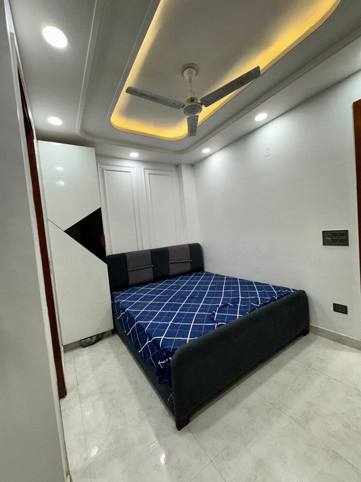 Bedroom, dwarka mor 3 Bedroom 85 Sq.Yd. Builder Floor In Dwarka Mor Delhi 9660153