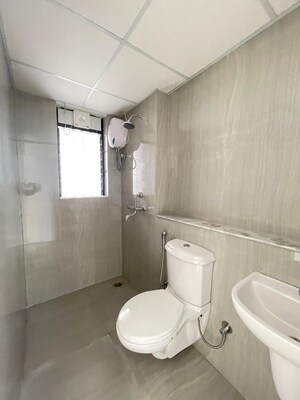 Bathroom in 1 BHK Apartment at Runwal Gardens Phase I, Dombivli East – for Rent