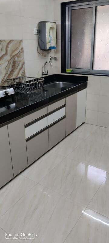 Kitchen in 3 BHK Apartment at Omkar Alta Monte, Malad East – for Sale