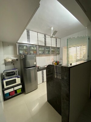 Kitchen in 3 BHK Apartment at Bredco Hill View Park, Kandivali East – for Rent