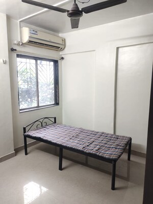 Bedroom in 1 BHK Apartment at Gurukrupa Corner, Kharadi – for Rent