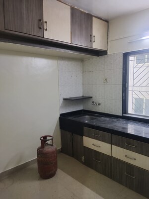 Kitchen in 1 BHK Apartment at Gurukrupa Corner, Kharadi – for Rent