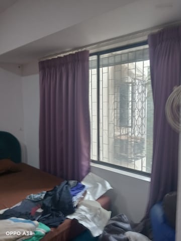 Living Room in 1 BHK Apartment at Andheri West – for Sale