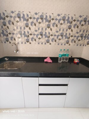 Kitchen in 1 BHK Apartment at Raunak Bliss, Ghodbunder Road – for Rent
