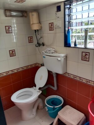 Bathroom in 2 BHK Apartment at Chincholi Apartment, Malad West – for Rent