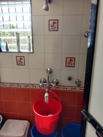 Bathroom in 2 BHK Apartment at Chincholi Apartment, Malad West – for Rent