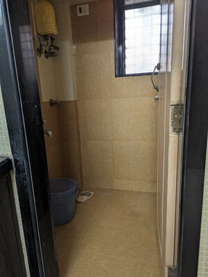 Bathroom in 1 BHK Apartment at Vaastu Omkar, Vile Parle East – for Rent