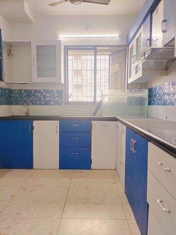 Kitchen in 2 BHK Apartment at Swastik Regalia, Waghbil – for Sale