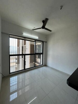 Living Room in 1 BHK Apartment at Lodha Crown Quality Homes, Majiwada – for Rent