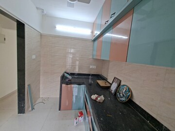 Kitchen in 2 BHK Apartment at Godrej Emerald, Ghodbunder Road – for Rent