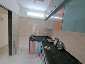 Kitchen in 2 BHK Apartment at Godrej Emerald, Ghodbunder Road – for Rent