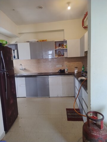 Kitchen in 4 BHK Apartment at Rishita Manhattan, Gomti Nagar – for Rent