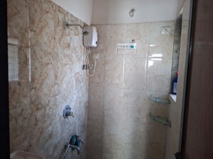 Bathroom in 1 BHK Apartment at Vihang Valley Phase 3, Kasarvadavali – for Rent