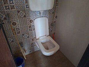 Bathroom in 1 BHK Apartment at Vihang Valley Phase 3, Kasarvadavali – for Rent