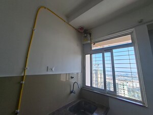 Kitchen in 1 BHK Apartment at Puranik Aarambh, Ghodbunder Road – for Rent