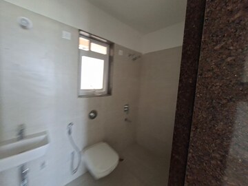 Bathroom in 1 BHK Apartment at Puranik Aarambh, Ghodbunder Road – for Rent