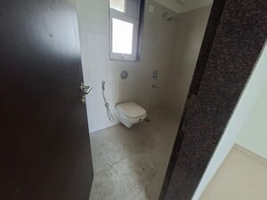 Bathroom in 1 BHK Apartment at KIPL Morya, Kasarvadavali – for Rent