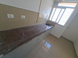 Kitchen in 1 BHK Apartment at KIPL Morya, Kasarvadavali – for Rent